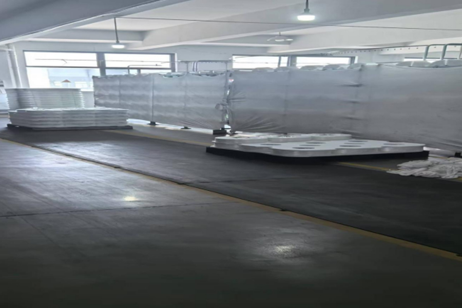 Táirgeadh fabraic liath - limistéar socrúcháin amhábhar