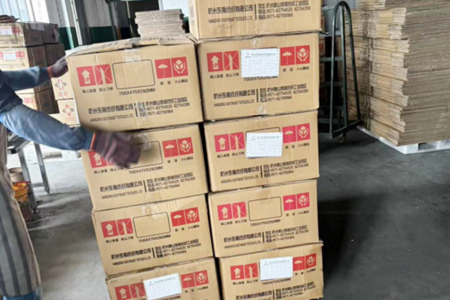 Limistéar táirgthe-pacáistithe DTY